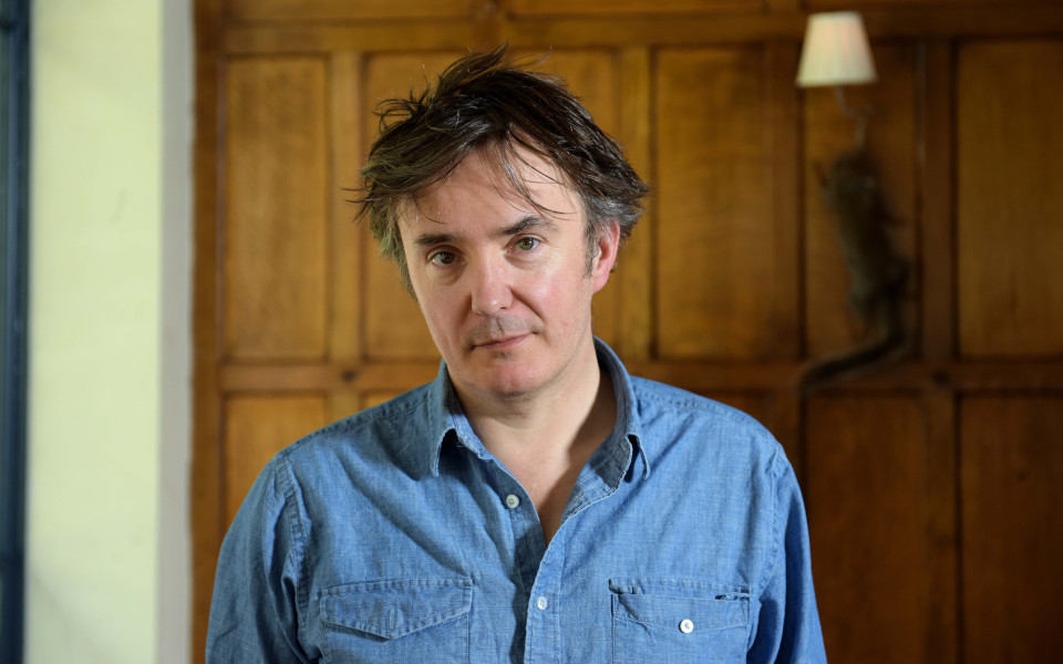 Dylan Moran Comedian Dylan Moran wearing a blue shirt