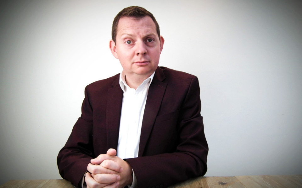 Matt Chorley Matt Chorley wearing a suit with his hands rested on a table