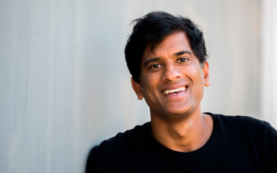 Dr Rangan Chatterjee Dr Rangan Chatterjee smiling against a white wall