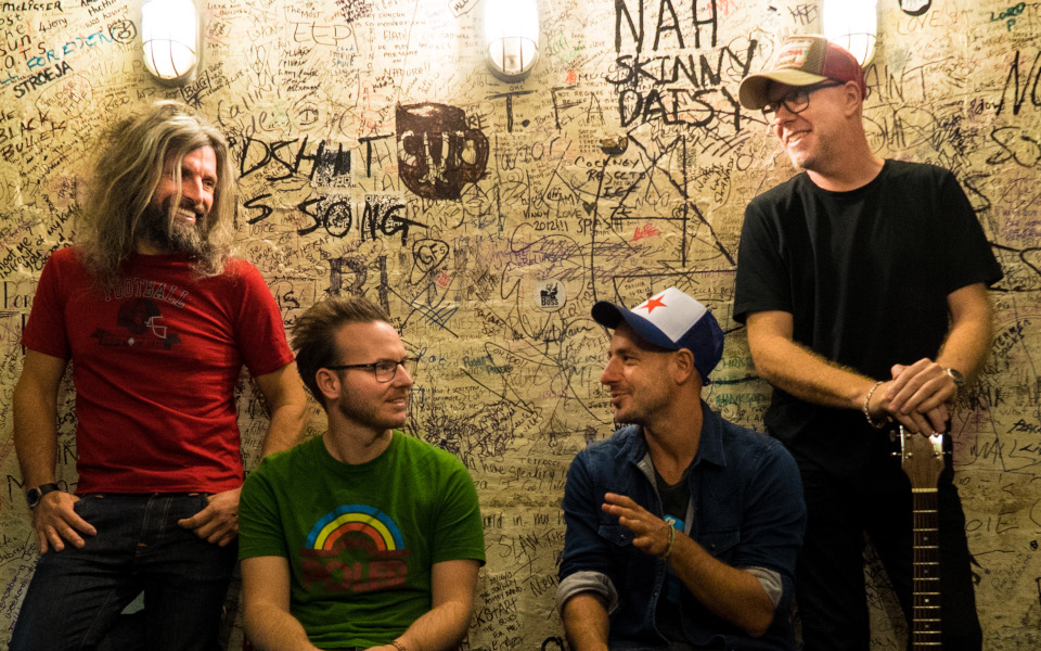 Turin Brakes Turin Brakes wearing tees against a graffiti wall
