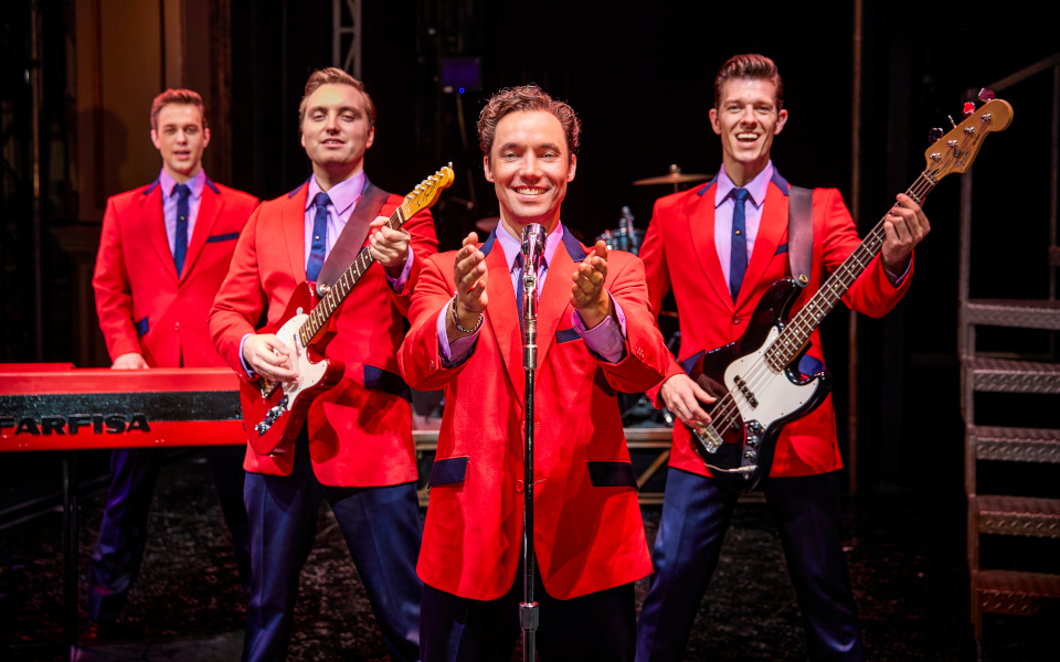 Jersey Boys The cast of Jersey Boys in their iconic red suits