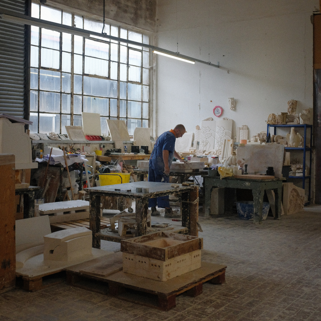 Inside the Workshop Inside the Workshop with machinery and tiling being worked on