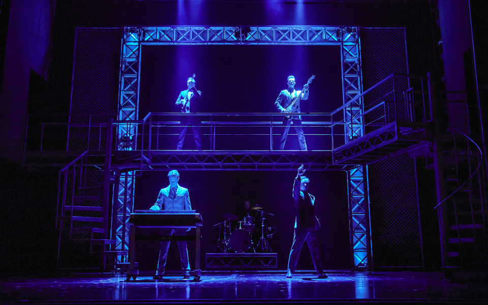 Jersey Boys Production Photo Blue lighting on the actors playing the four seasons